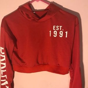 A cropped red hoodie